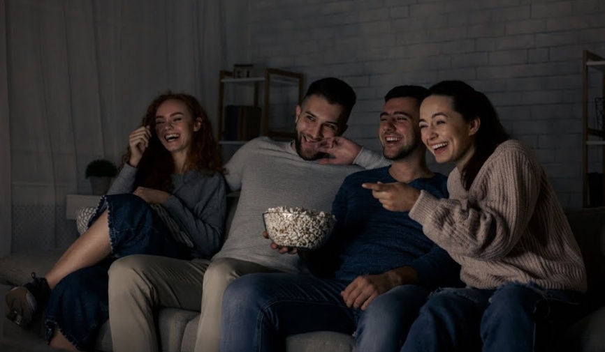 Group of friends watching a movie | Movies like Mean Girls